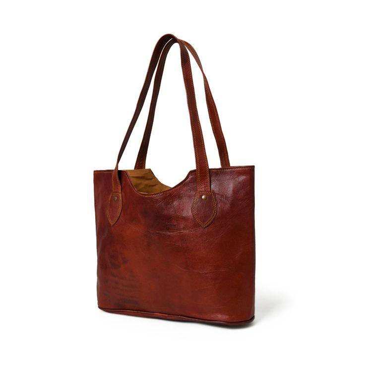 This timeless and versatile tote is perfect for those looking for an elegant accessory. Crafted from high-quality brown leather, this tote is designed with practicality and durability in mind. The brown color adds sophistication to any outfit, making it suitable for the office or a casual outing.   With its timeless appeal and practical design, a classic brown tote is a reliable and stylish choice that effortlessly combines fashion and functionality. It is a staple accessory that complements you Hobo Bags For Women, Leather Tote Bags, Vegan Leather Tote, Work Tote, Classic Brown, Brown Tote, Cocoa Brown, Vegan Leather Bag, Hobo Bags