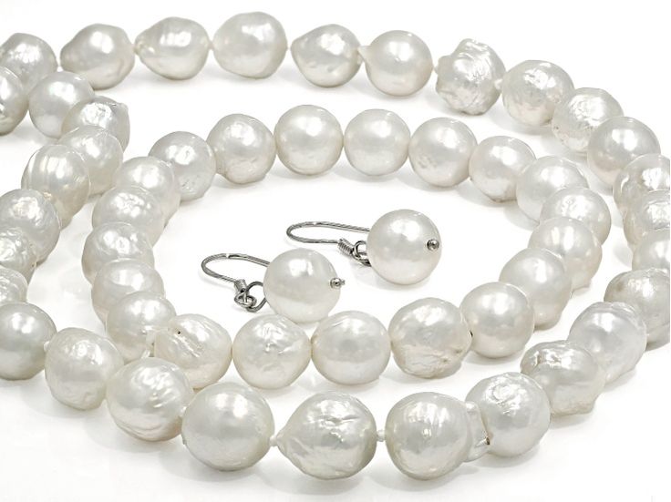 Genusis™ 9-11mm Cultured Freshwater Pearl Rhodium Over Sterling Silver Necklace, Bracelet, & Earring Boxed Set. Necklace measures approximately 3/8 of an inch in width and has a bead clasp. Bracelet measures approximately 3/8 of an inch in width and has no clasp. Earrings measure approximately 1 3/16" L x 3/8" W and have fishhook backings. Colors, shapes, and sizes may vary. High Luster Round Beads Jewelry For Wedding, High Luster Round Bead Jewelry For Weddings, White High Luster Round Jewelry, White Round High Luster Jewelry, White High Luster Fine Jewelry, Pearl White Round Jewelry Set Gift, White Single Strand Round Jewelry, White Round Single Strand Jewelry, Pearl White High Luster Round Jewelry