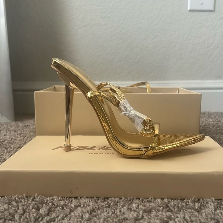 Brand New And Never Worn High Heel Sandals. Gold Sandals With Wrapped Heel For Date Night, Gold Heels With Single Toe Strap For Spring, Gold Single Toe Strap Heels For Spring, Gold Sandals With Padded Heel For Date Night, Gold Open Heel Sandals For Night Out, Gold Sandals With Single Toe Strap For Cocktail, Gold Open Toe Sandals For Cocktail, Chic Gold Sandals For Cocktail, Gold Open Toe Sandals For Night Out