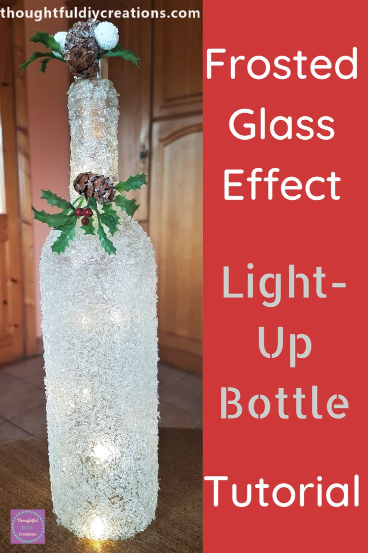 frosted glass bottle with christmas lights on it and the words frosted glass effect light up bottle