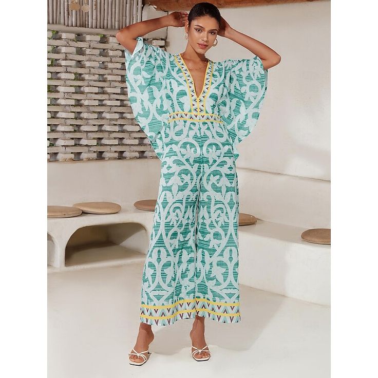 Category:Jumpsuit; Season:Spring  Summer; Fabric:Terylene; Sleeve Length:Half Sleeve; Look After Me:Washable,Wash with similar colours,Machine wash; Gender:Women's; Style:beach vacation; Elasticity:Inelastic; Occasion:beach vacation,Daily Wear; Fit Type:Loose Fit; Waistline:High ; Pattern:Folk; Design:Print; Neckline:V Neck; Sleeve Type:Magyar Sleeve; Trends:Wide-legged,Print; Pants Type:Wide Leg Pants; Jumpsuit Type:Jumpsuit; Listing Date:05/03/2024; Production mode:External produce; Bust:; Hip Green V-neck Jumpsuits And Rompers For Beach Season, Summer V-neck Jumpsuits And Rompers For Vacation, V-neck Tropical Print Swimwear For Summer, Green V-neck Swimwear For Summer, Green Tropical One-piece For The Beach, Green Tropical One-piece For Beach, Green Tropical V-neck Jumpsuits And Rompers, Printed V-neck Beachwear One Piece, V-neck One Piece For Spring And Summer