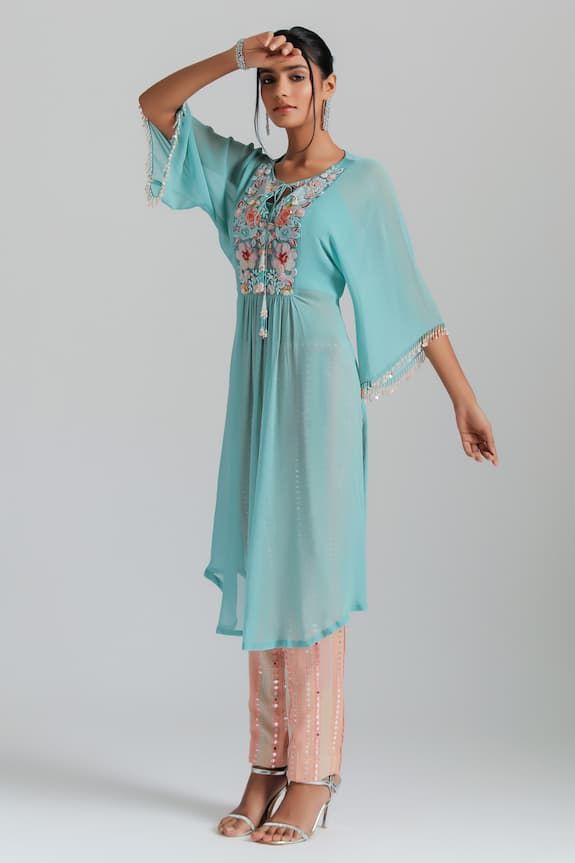 Aqua blue padded kaftan tunic with floral print, bead, thread embroidery in  floral patchwork pattern. Paired with inner bustier and mirror stripe embroidered trouser. - Aza Fashions Designer Embroidered Neckline Kurta Tunic, Designer Embroidered Neckline Tunic Kurta, Maxi Length Kurta With Embroidered Neckline For Eid, Bohemian Sets With Embroidered Neckline And Long Sleeves, Blue Bohemian Kurta With Traditional Drape, Bohemian Style Georgette Salwar Kameez For Summer, Blue Bohemian Kurta With Resham Embroidery, Anarkali Kurta With Back Tassel Tie-up For Navratri, Festive Tunic Kurta With Embroidered Neckline