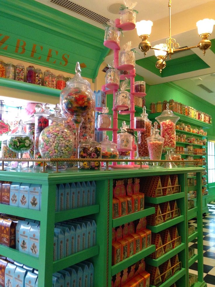 the candy shop is filled with lots of colorful candies