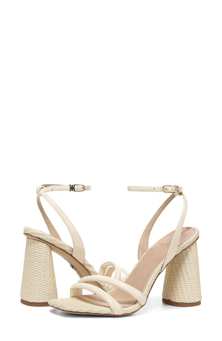 Delicate straps frame this alluring sky-high sandal that's party-ready with a flirty buckle closure at the ankle. 4" heel (size 8.5) Leather or synthetic upper/leather lining/synthetic sole Imported Vacation Heels With Strap, Synthetic, Spring Cream Strappy Heels, Beach T-strap Sandals With Toe Loop And Heel Strap, Cream Sandals With Wrapped Heel, Medium Width, Cream Sandals With Heel Loop, Medium Width, High Sandals, Wide Width Sandals, Sky High, Strappy Sandals