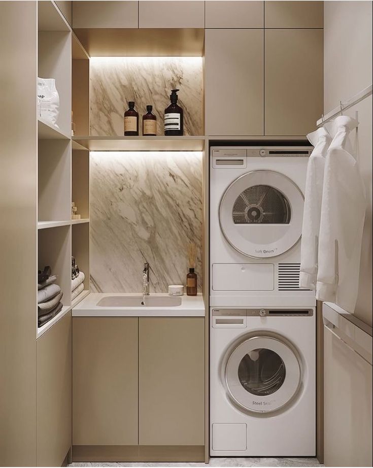 a washer and dryer in a small room