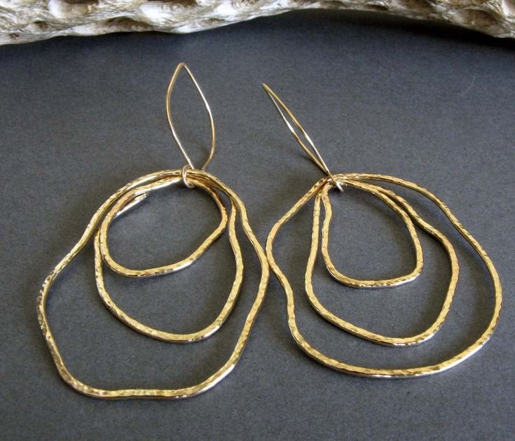 "Artisan handmade organic shape earrings. Each component is hand shaped so each will have it's own unique shape. The Details ∞ Artisan handmade jewelry ∞ 14k gold filled handmade textured drops ∞ 14k gold filled handmade ear hooks ∞ Approximate total length ~ 3\" ∞ Made to order Θ Allow up to 14 business days before shipment Θ ∞ Gift box included ∞ Made in the USA Pick up a matching pendant necklace here... https://www.etsy.com/listing/641990023/gold-boho-statement-necklace-large VISIT OUR SHOP: Artisan Freeform Gold Jewelry, Gold Freeform Earrings As Gift, Gold Freeform Earrings For Gift, Hand Forged Freeform Elegant Jewelry, Hammered Freeform Jewelry For Gifts, Hammered Freeform Jewelry As A Gift, Modern Freeform Gold Jewelry, Elegant Handmade Freeform Earrings, Texture Jewelry