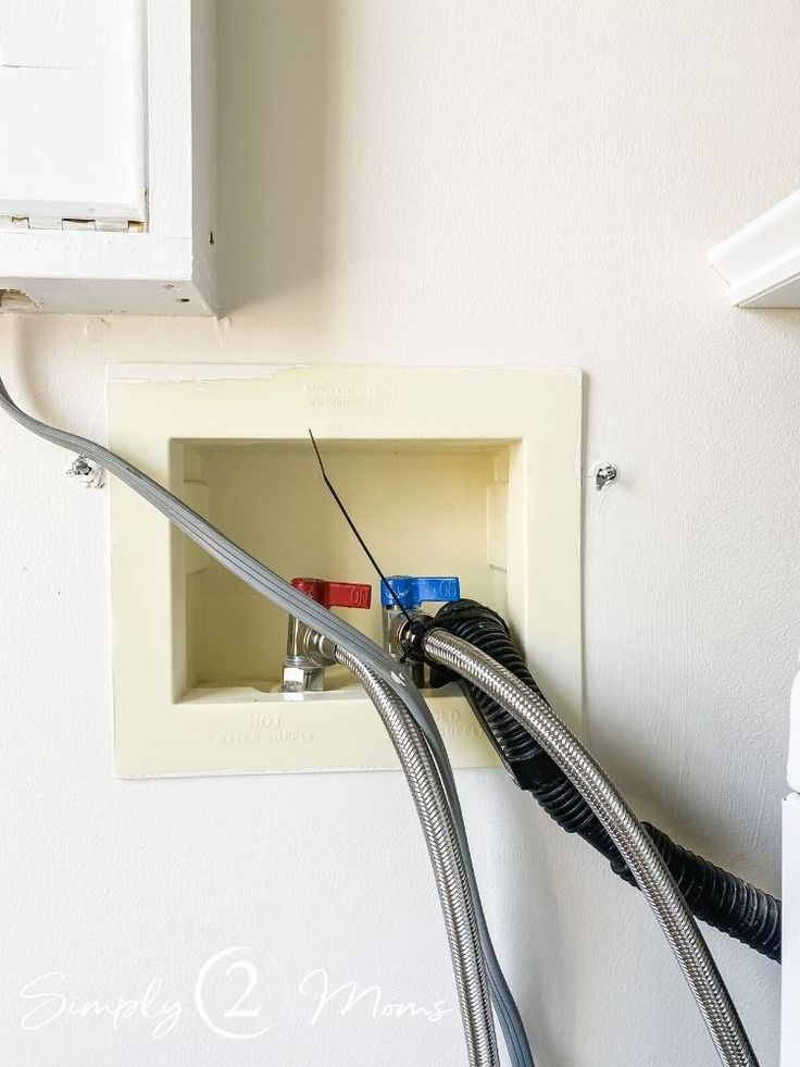 an electrical outlet in the wall with wires attached to it