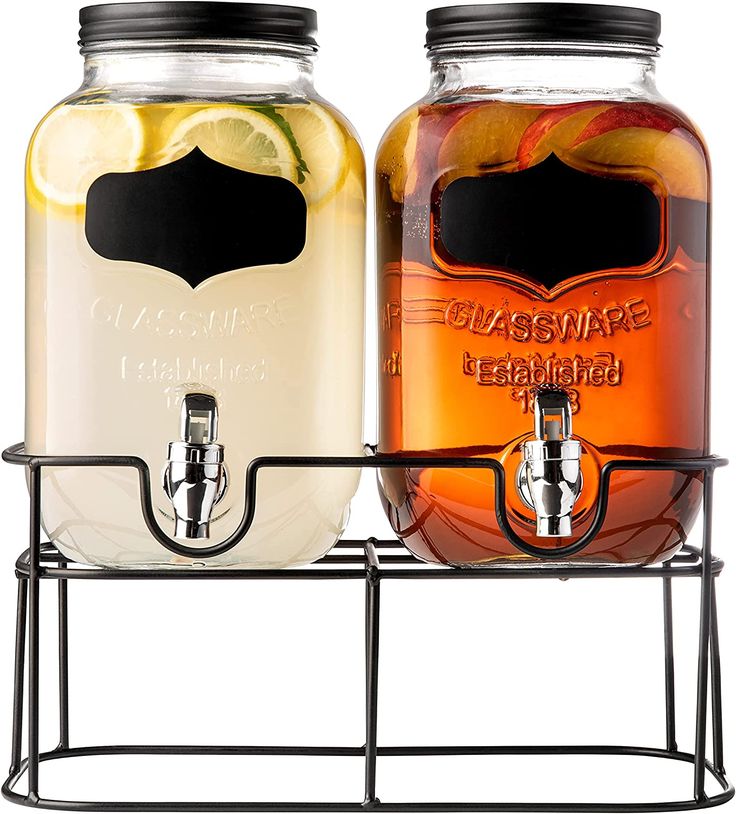 two jars with drinks in them sitting on a rack