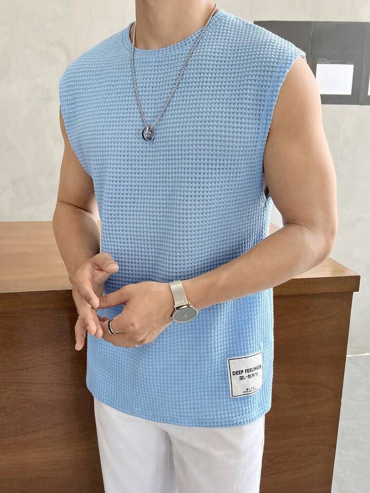 Blue Casual Sleeveless Sweater Vest, Light Blue Casual Summer Vest, Solid Sleeveless Sweater Vest For Spring, Blue Cotton Sleeveless Sweater Vest, Stretch Light Blue Sleeveless Top, Light Blue Stretch Sleeveless Top, Blue Sleeveless Top For The Beach, Blue Sleeveless Top For Beach, Sleeveless Blue Top For Beach