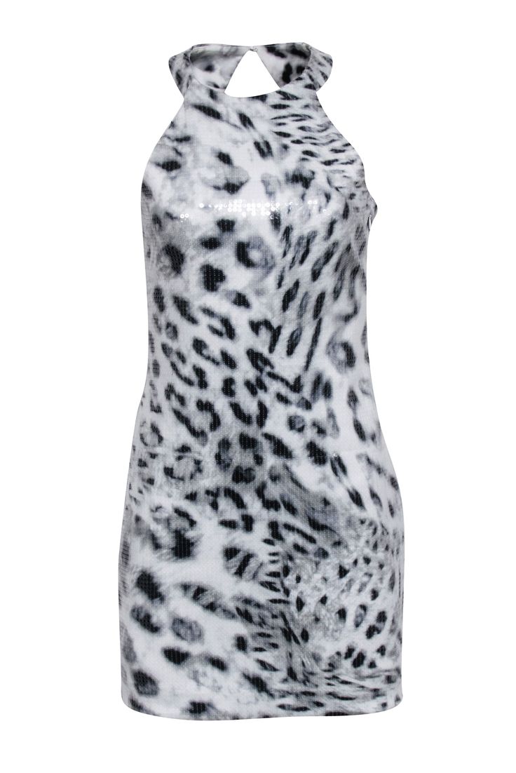 Get wild and sparkly in this Parker sequin grey and white leopard print dress. With a high neck and cut out back detail, this sleeveless dress is perfect for a girls' night out in Vegas or a bachelorette party in Miami. Style it with strappy heels for a fun and fearless look. Size M Shell 95% Polyester, 5% Spandex Lining 97% Polyester, 3% Spandex Invisible side zipper Cut out back details Sleeveless High neckline Bust 34" Waist 28" Shoulder to hem 34" Sleeveless Leopard Print Mini Dress For Party, Sleeveless Leopard Print Party Dress, Chic Stretch Sequin Sleeveless Dress, Chic Stretch Sleeveless Sequin Dress, Chic Sleeveless Stretch Sequin Dress, Summer Stretch Mini Dress With Contrast Sequin, Stretch Mini Dress With Contrast Sequin For Summer, Sleeveless Stretch Dress With Contrast Sequins, Sleeveless Sequin Dress For Spring Clubbing