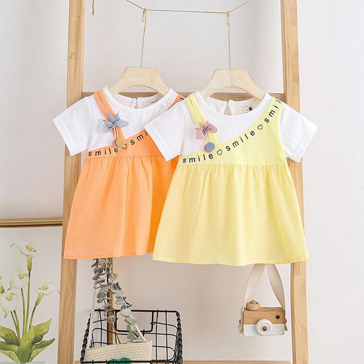 Playful Short Sleeve Cotton Dress, Cotton Summer Dress For Playwear, Cute Summer Patchwork Dresses, Summer Cotton Patchwork Dresses, Cute Short Sleeve Patchwork Dresses, Yellow Patchwork Summer Dresses, Yellow Summer Dresses With Patchwork, Playful Cotton Summer Dress, Casual Cotton Color Block Dresses