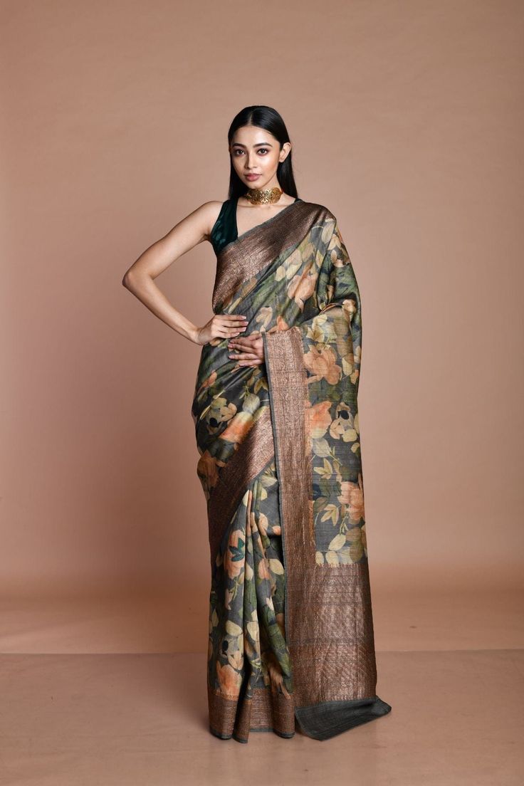 The real charm lies in elegance and our handwoven tussar silk sarees are just the perfect match for any of your festive get-together. The weaving city Varanasi sure has some style legacy and the rich drapery that evolved from this region is the Banarasi sarees. There are various type of Banarasi sarees available and one among them is the Banarasi weaving tussar silk saree which is soft, flowy and light weight Luxury Bohemian Banarasi Silk Saree, Festive Raw Silk Dupatta With Floral Print, Bollywood Style Raw Silk Saree With Printed Motifs, Festive Tussar Silk Saree With Kalamkari Print, Silk Saree With Floral Print In Traditional Drape, Elegant Festive Saree With Kalamkari Print, Designer Raw Silk Saree With Kalamkari Print, Festival Raw Silk Saree With Printed Motifs, Diwali Raw Silk Saree With Printed Motifs