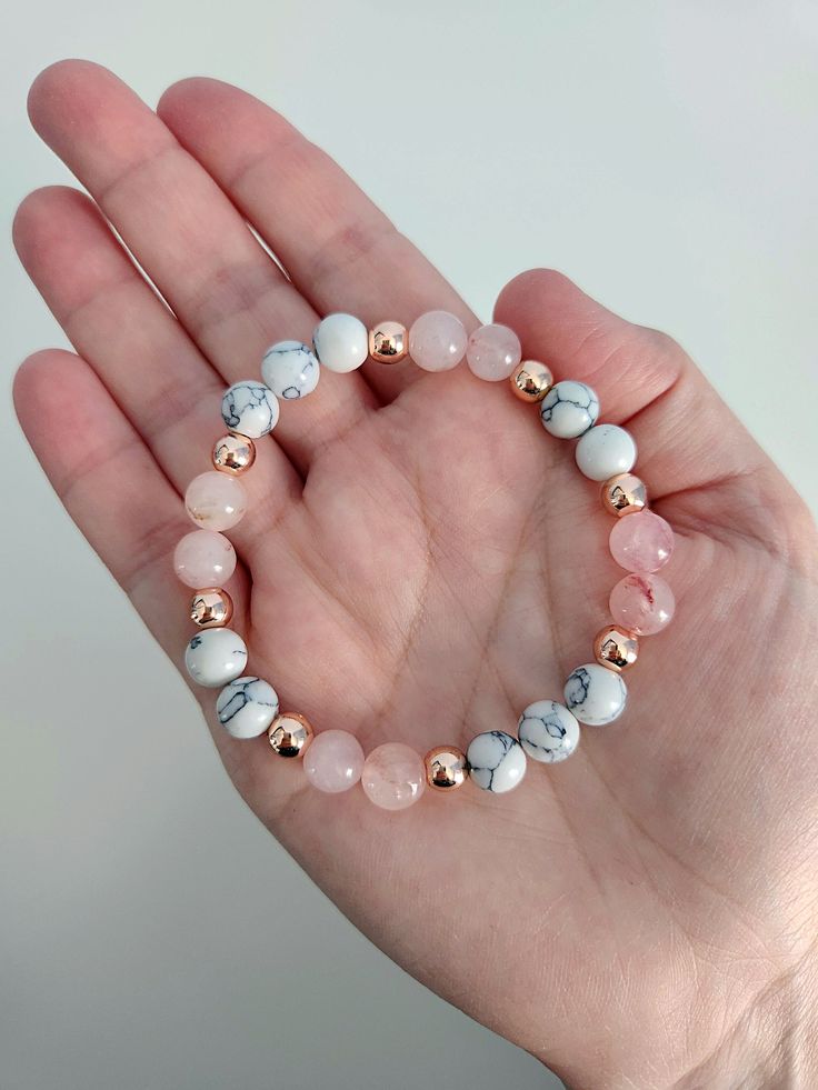 Absolutely stunning! This gorgeous gemstone bracelet features natural Rose Quartz, White Howlite and Rose Gold Hematite beads.  Beads are 8mm and 4mm. Bracelet stretches to fit. Coral Beaded Bracelets, Bracelets Of Beads, Natural Bead Bracelets, Natural Beads Bracelet, Crystal Bead Bracelet Ideas, Bracelet Product Photography, Stone Bracelet Ideas, Crystal Bracelet Ideas, Bracelet Images