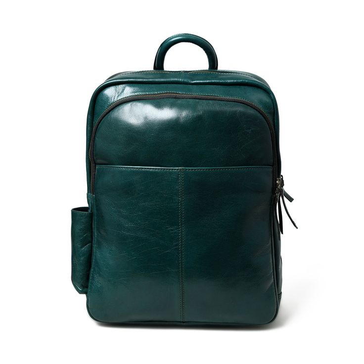 Make a bold statement with this head-turning Italian green leather backpack that radiates confidence and style. The glossy finish enhances its vibrant sea green color, creating a mesmerizing and eye-catching accessory. The sleek design and luxurious feel of the leather makes it a standout piece in any fashion ensemble, promising to elevate your look with a touch of glamour. Whether navigating city streets or making a grand entrance at an event, this bold and eye-catching green leather backpack i Sea Green Color, Buffalo Leather, Grand Entrance, Handcrafted Leather, Sea Green, City Streets, Green Leather, Italian Leather, Leather Backpack