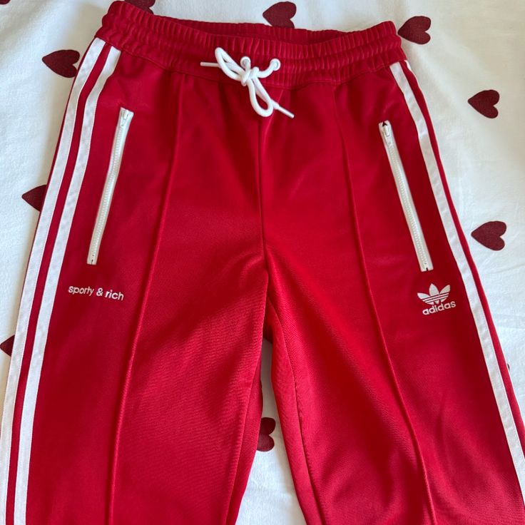 Adidas X Sporty & Rich Red Track Pant. Size Women's Xs. New With Tags, Never Worn. Elastic Waistband With Drawstring. Side Pockets. Zippers At Ends Of The Pants. Adidas Red Bottoms For Spring, Red Adidas Bottoms For Spring, Adidas Sporty Red Bottoms, Track Pants Women, Track Pant, Sporty And Rich, Adidas X, Red Adidas, Adidas Pants