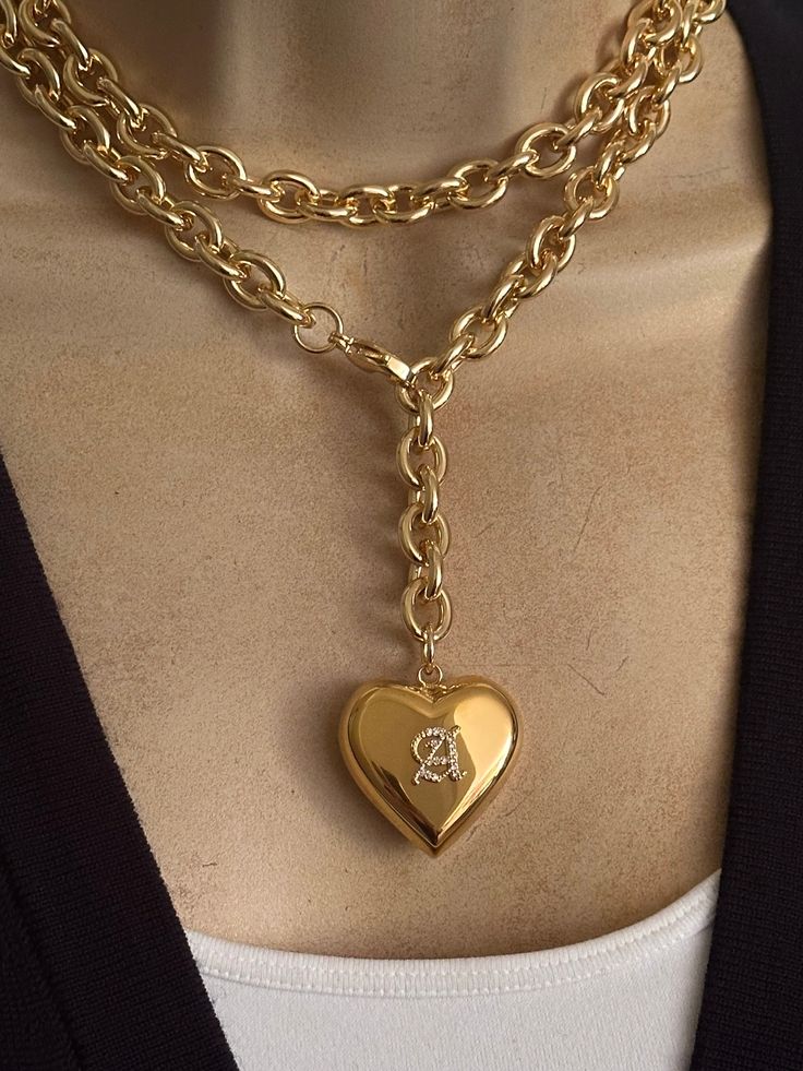 Personalized puffy heart statement necklacelariat. CZ old English font(choose at the checkout). 18k gold plated stainless steel components. Chunky rolo chain has a good weight(not hollow). Heart measures 30mmx30mm. Lobster clasp can be hooked to any chain links.  2 length options: 18 inches  33 inches is longe and can be doubled.  Length doesn't include the pendant.  🎁All orders are shipped in a gift box. Elegant Personalized Heart Chain Necklace, Gold Heart Pendant Chain Necklace, Trendy Gold Heart Necklace With Adjustable Chain, Gold-tone Charm Necklace With Chunky Chain For Gift, Trendy Gold Necklaces For Valentine's Day, Gold-tone Chunky Chain Charm Necklace Gift, Chunky Chain Heart Pendant Necklace As Gift, Elegant Heart Necklace With Chunky Chain For Gift, Chunky Chain Heart Pendant Necklace For Gift