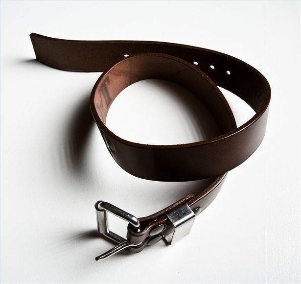 a brown leather belt with two metal buckles on it's sides and a silver hook