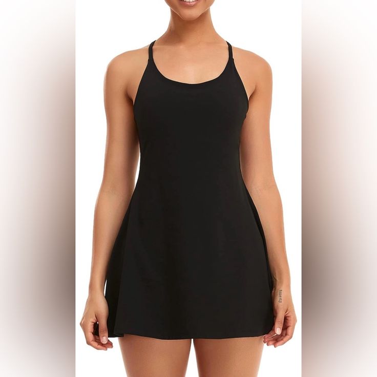 Workout Dress With Built-In Bra & Shorts Black Sleeveless Tennis Dress With Built-in Bra, Fitted Black Tennis Dress With Built-in Bra, Black Stretch Dress With Built-in Bra, Black Stretch Mini Tennis Dress, Chic Stretch Dresses For Workout, Chic Stretch Workout Dress, Chic Sleeveless Workout Dress, Black Mini Tennis Dress For Workout, Sleeveless Tennis Dress For Summer Loungewear