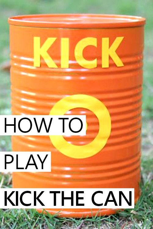 an orange plastic barrel with the words kick on it in front of green grass, and yellow letters that read how to play kick the can