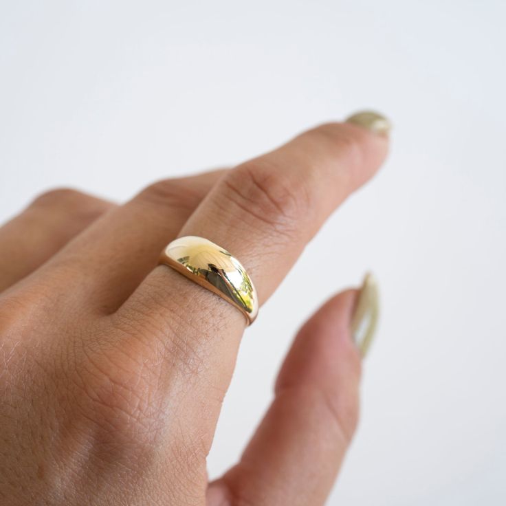 14k Solid Gold Dome Ring Wear on it's own as a statement or stack it with your other rings. Built to last a lifetime and more. Handmade in California. Worn everywhere. Material: Solid 14k Gold Width: 8mm wise on the top and 2mm wide on the shank Fine Jewelry Stackable Wide Band Ring For Anniversary, Yellow Gold Thick Band Promise Ring, Heirloom Style Stackable Ring With Thick Band, Heirloom Thick Band Stackable Rings, Fine Jewelry Thick Band Ring With Diamond Cut, Stackable Rings With Thick Band For Wedding, 14k Gold Wide Band Promise Ring, Modern Wide Band 14k Gold Wedding Ring, Yellow Gold Wide Band Promise Ring