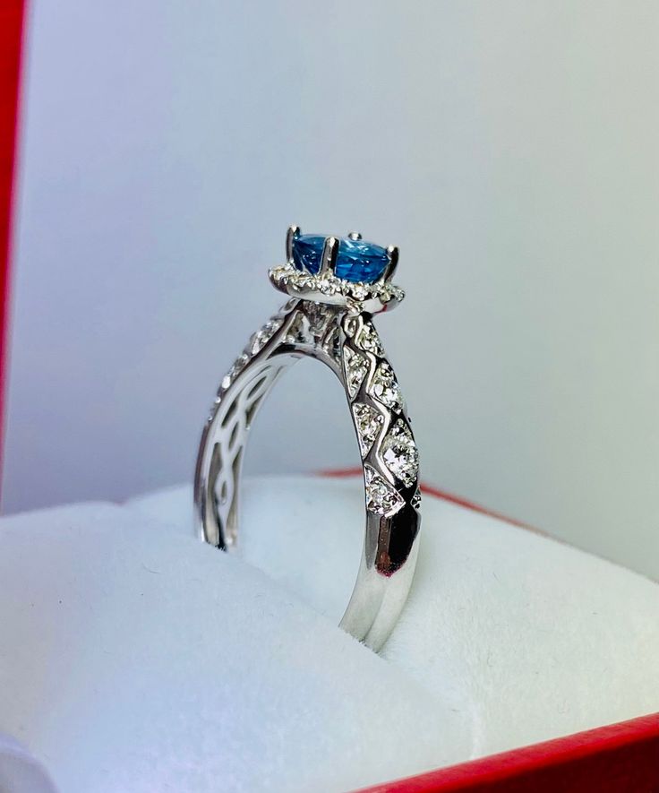 Gorgeous 14k White Gold Sapphire and halo Diamond Ring: Sapphire: 0.74CT Side Diamonds: 0.40CT Color: E Clarity: VS2 Total ring weight: 3.5GR 14K White Gold Ring sizing available free of charge For more information regarding this item feel free to reach me so I can accommodate your needs. Thank you Gia Certified Diamond Cluster Halo Ring, 14k White Gold Gia Certified Cluster Ring, Gia Certified Cluster Halo Ring In White Gold, Gia Certified Cluster Halo Ring For Anniversary, Anniversary Emerald Halo Ring, Halo Design Cubic Zirconia Ring For Anniversary, Silver Halo Ring With Gia Certified Diamond, Silver Diamond Halo Ring Gia Certified, Fine Jewelry Cluster Halo Ring In Platinum