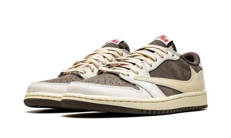 The Travis Scott x Air Jordan 1 Low “Reverse Mocha” is a collaboration between the hip-hop artist and Jordan Brand on the low-top lifestyle shoe that “reverses” the color block of the duo’s original Jordan 1 Low collaboration from 2019.  Released in July 2022, the “Reverse Mocha” features the same color block as Travis and Jordan Brand’s “Mocha” or “Cactus Jack” Jordan 1 Low, albeit in a flipped color coordination.  The perforated toe, mid-panel, and collar are designed in mocha (brown) nubuck. Mocha Shoes, Reverse Mocha, Wings Logo, Hip Hop Artists, Mocha Brown, Air Jordan 1 High, Air Jordan 1 Low, Jordan 1 High, Jordan 1 Low