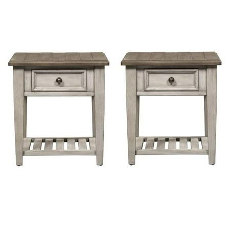 two white nightstands with one drawer open and the other closed, both side by side