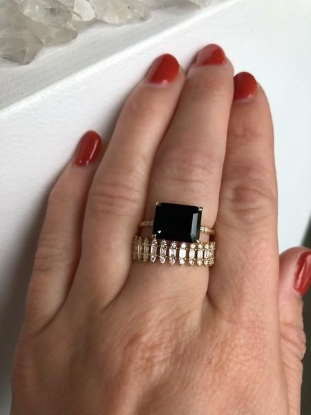 Spin off of our best-selling Onyx Ring, this 3.8ct emerald cut Black Onyx is set horizontally for more unique feel. Set into our signature claw prongs. Subtle, quarter band diamonds, 0.08ct.  Treat with love due to the center stone softness. Band width, 1.5mm In stock: 14k Yellow Gold Yellow Headboard, Statement Engagement Ring, Wedding Ready, Ring Inspo, Future Engagement Rings, Claw Prong, Black Onyx Ring, Alternative Engagement Rings, Onyx Ring