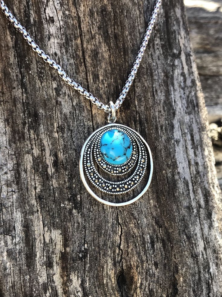 WANTED all over the Universe. Turquoise is recognized Sought After by early KINGS, MOVERS, and SHAKERS! Turquoise is said to be a vessel Imbued with energies associated with Heaven! All My Turquoise is Carefully chosen from around the World. I love the Raw Authentic look and feel of the stone...so I do not over polish the Turquoise! True Bohemian Style...an Original work of Art that you can treasure for a lifetime! Each of My Creations are One of A Kind and are Hand wrought to bring out the best Bohemian Round Pendant Necklace For Beach, Bohemian Style Round Pendant Necklace For Beach, Southwestern Turquoise Jewelry For Beach, Bohemian Silver Turquoise Necklace For Beach, Bohemian Round Pendant Jewelry For Beach, Handmade Hippie Turquoise Necklace, Bohemian Turquoise Jewelry, Hippie Turquoise Festival Jewelry, Bohemian Necklace With Round Pendant