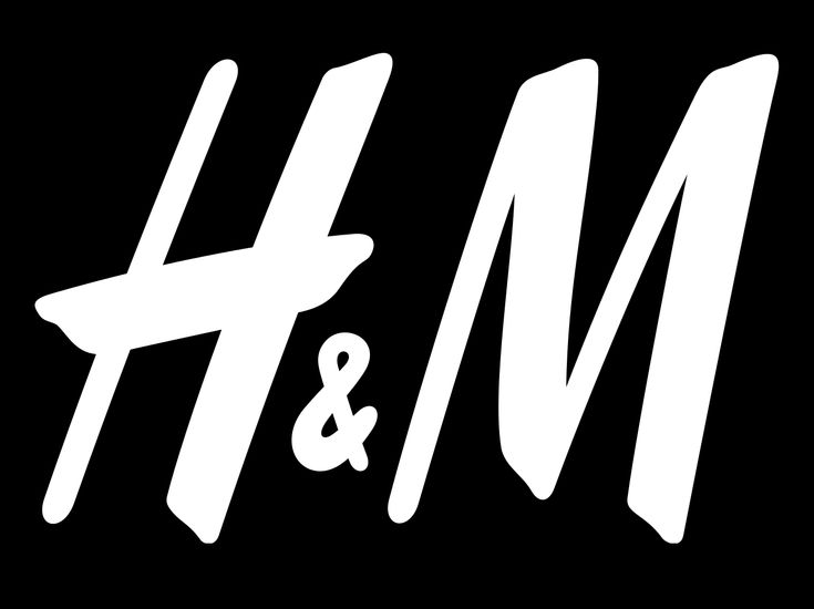 the h and m logo is shown in white on a black background with an arrow