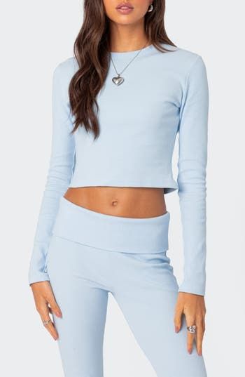 Love to layer in this close-fitting top designed in a cropped silhouette with easy-moving stretch. Crewneck Long sleeves 95% cotton, 5% spandex Machine wash, dry flat Imported Trendy Fitted Cropped T-shirt For Loungewear, Stretch Elastane Cropped Tops, Fitted Cotton Crop Top For Loungewear, Trendy Tops With Thumbholes For Loungewear, Fitted Solid Color Cropped T-shirt Athleisure, Fitted Solid Cropped T-shirt For Athleisure, Fitted Loungewear Tops With Thumbholes, Casual Elastane Crop Top, Fitted Cropped T-shirt For Athleisure