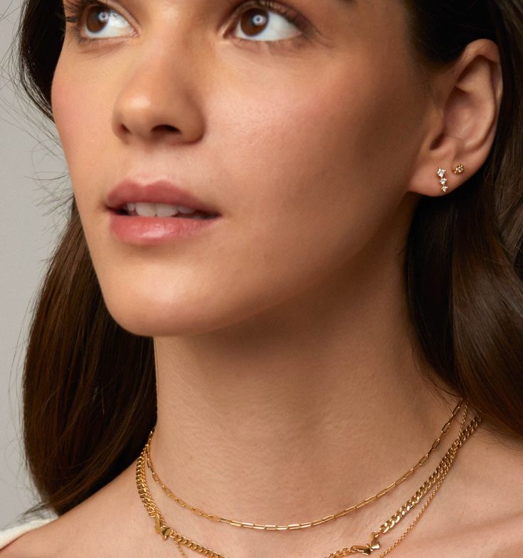 This dainty gold chain is a perfect delicate necklace to layer or wear alone. It is the perfect pendant chain to hang chains on. Made to stack, layer, and wear everyday.  Also available in sterling silver.
Adjustable length: 17"- 19"