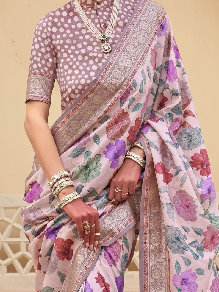 This fascinating baby pink floral printed silk traditional saree with blouse is a stunning choice for weddings, festivals, and other special occasions. The vibrant baby pink color of the saree, paired with the intricate floral print work and zari weaving, makes it a standout piece that is sure to turn heads wherever you go.
The saree comes with a matching light brown color silk blouse that also features printed work and zari weaving, adding to the overall elegance and charm of the ensemble. The Traditional Pre-draped Saree With Floral Print For Eid, Traditional Floral Pre-draped Saree For Eid, Floral Print Traditional Drape For Eid, Silk Saree With Floral Print For Navratri, Navratri Silk Saree With Floral Print, Floral Print Traditional Wear For Wedding And Navratri, Eid Floral Print Pre-draped Saree, Traditional Wear With Floral Print For Wedding And Navratri, Silk Pre-draped Saree In Pink With Floral Print