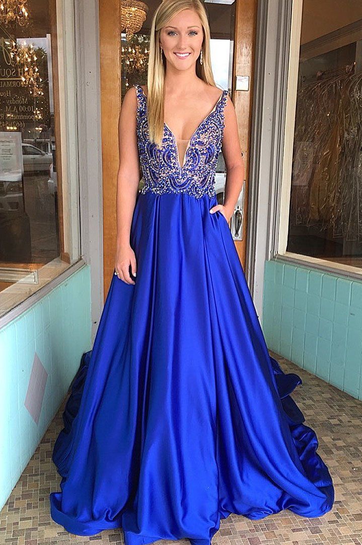 Blue V-neck Prom Gown, Blue Evening Dress For Prom Season, Blue Gown For Prom Season Banquet, Blue Gown For Prom Banquet, Blue Gown For Banquet And Prom Season, Blue V-neck Evening Dress With Sweep Train, Royal Blue Ball Gown For Banquet, Blue Ball Gown For Homecoming, Blue Ball Gown For Homecoming And Prom