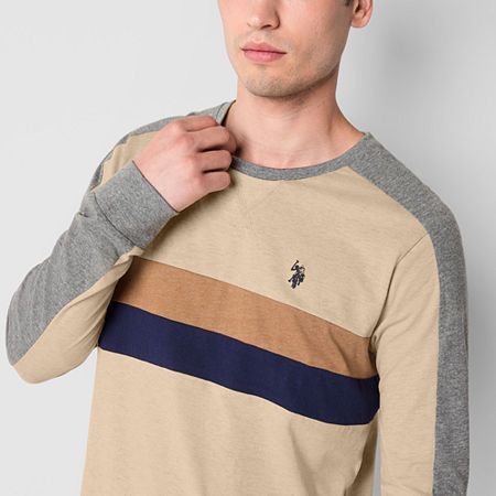 During the fall and winter seasons, it's essential to layer warm basics into your rotation like this striped long-sleeve men's t-shirt from U.S. Polo Assn. Cut for a classic-fit from soft, stretch cotton-jersey, this tee has a crew neckline, long sleeves, and is complete with the brand's logo embroidered at the front. Pair it with jeans and lace-up boots.Features: EmbroideredClosure Type: Pullover HeadFit: Classic FitNeckline: Crew NeckSleeve Length: Long SleeveFiber Content: 95% Cotton, 5% Span Large Shirts, Mens Crew Neck, Embroidered Shirt, Striped Long Sleeve, Logo Embroidered, Stretch Cotton, Crew Neckline, Shirt Shop, Long Sleeve T Shirt