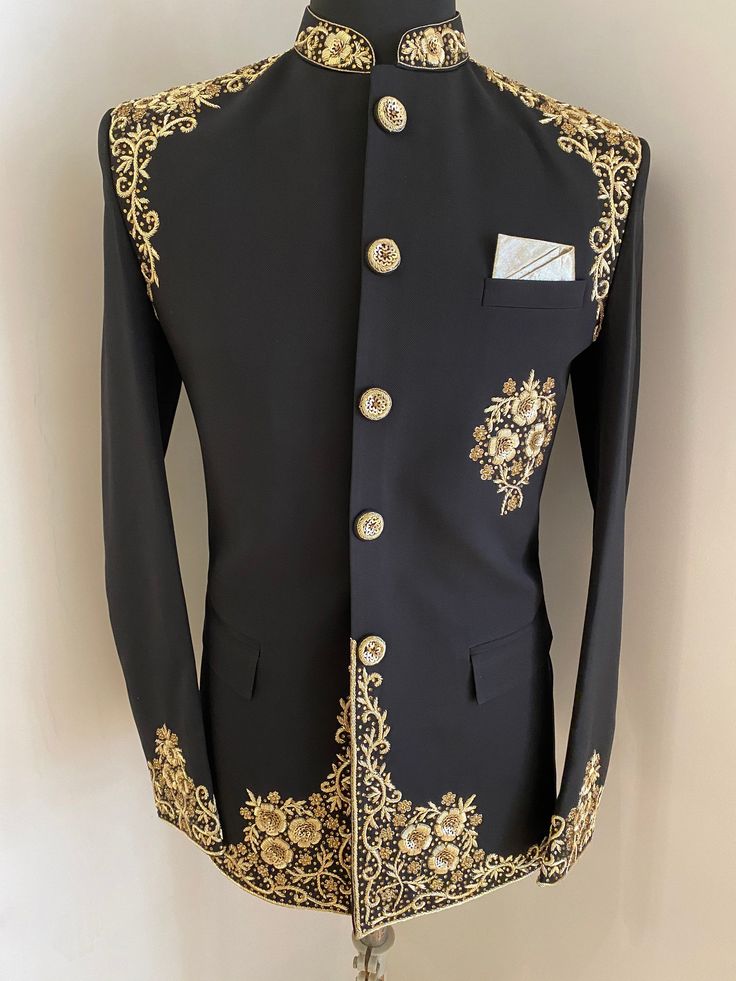 This is zardosi and gold zari handwork done on this black Jodhpuri.It's rich and good quality handwork make this Jodhpuri looks elegant . Colour options available. Customisation available. Designer Black Kurta With Naqshi, Formal Black Sherwani With Naqshi Detailing, Fitted Black Sherwani With Naqshi Detail, Fitted Black Sherwani With Naqshi, Black Naqshi Bandhgala For Festive Occasions, Designer Black Nehru Jacket For Ceremonial Occasions, Formal Black Bandhgala With Naqshi Detailing, Fitted Black Bandhgala With Naqshi Detailing, Designer Black Bandhgala With Naqshi Detailing