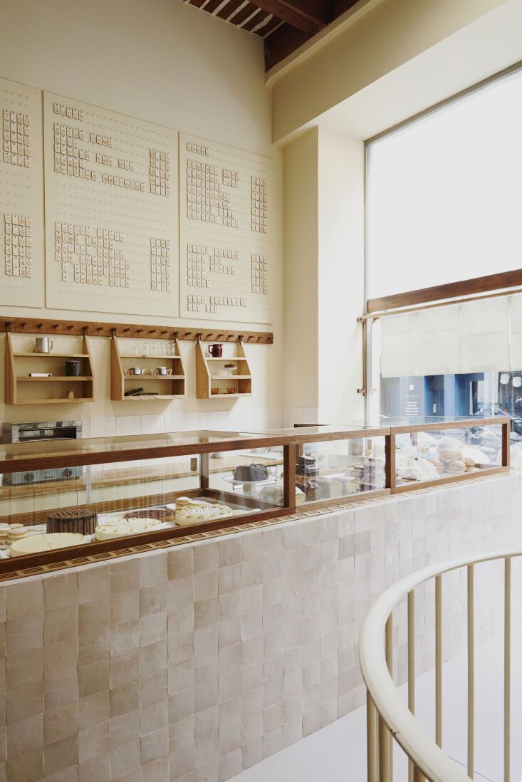 the inside of a bakery with lots of counter space