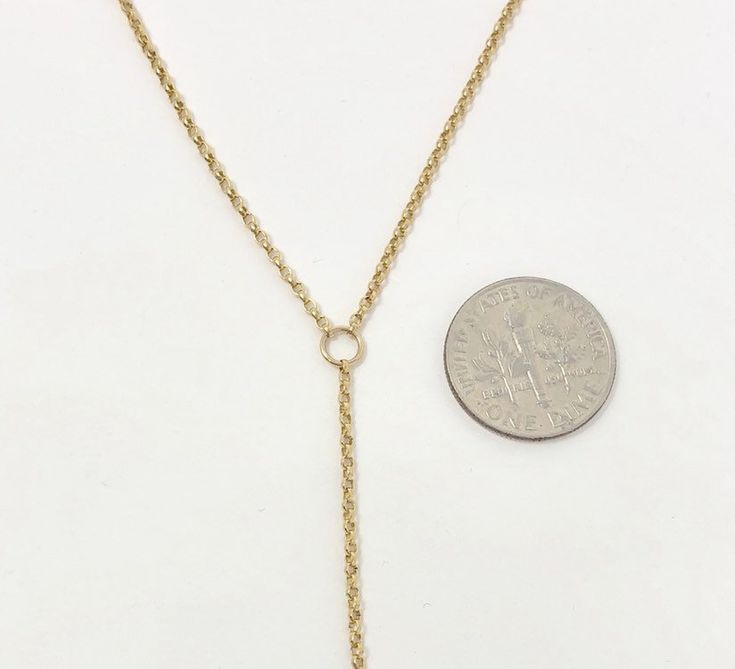 This long drop lariat is made from a delicate rolo chain. The chain is 14k gold fill, 14k rose gold fill, or sterling silver chain. The drop chain of the necklace measures 6 inches. If you want a longer or shorter drop chain, let me know in the comment section. The drop chain length is not included in the necklace length. LENGTH - Necklace on the model is 22 inches (the model's neck circumference is 12 inches). YOUR ORDER - Choose either gold fill or sterling silver in the drop-down menu. - Sele Rose Gold Lariat Chain Necklace With Adjustable Chain, Rose Gold Lariat Necklace With Adjustable Chain, Yellow Gold Lariat Necklace With Cable Chain, Dainty Lariat Necklace With Gold Chain, Rose Gold Lariat Necklace With Delicate Chain, Dainty Gold Chain Lariat Necklace, Dainty Gold Lariat Necklace, Rose Gold 14k Gold Lariat Necklace, Gold Lariat Necklace With Adjustable Teardrop Pendant