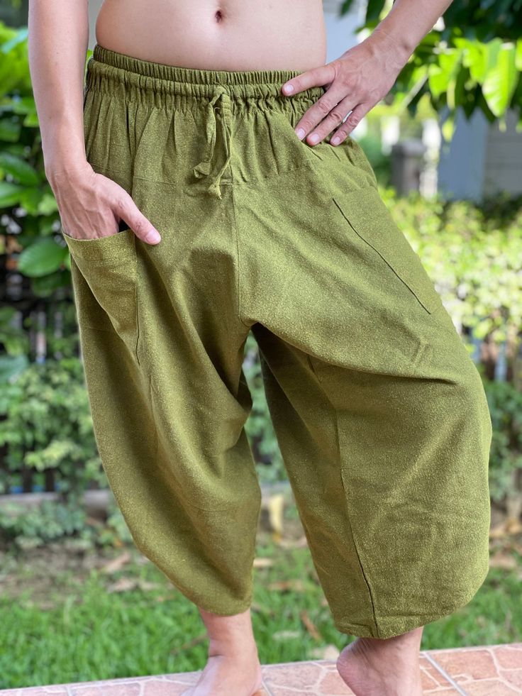 "Male Model Tall 5'9\" Waist 34\" Samurai Pants - elastic waistband and cuffs - Fits all! Unisex pants These beautiful casual pants are unique & comfortable to wear Handmade with a very lovely pattern, it is easy to wear and great for many occasions. One size fits most. These pants are great for many different activities like traveling, dancing, going to festivals, rock climbing, yoga, meditation, massage, working out, martial arts, Taichi MATERIAL: 100% Cotton APPROX MEASUREMENT: Waist: 24\ Casual Harem Yoga Pants, Casual Harem Parachute Pants For Yoga, Ankle-length Relaxed Fit Harem Pants, Casual Cotton Harem Cargo Pants, Casual Harem Pants, Casual Ankle-length Harem Yoga Pants, Casual Ankle-length Harem Pants For Yoga, Cotton Harem Pants With Elastic Waistband For Meditation, Casual Harem Yoga Pants With Pockets