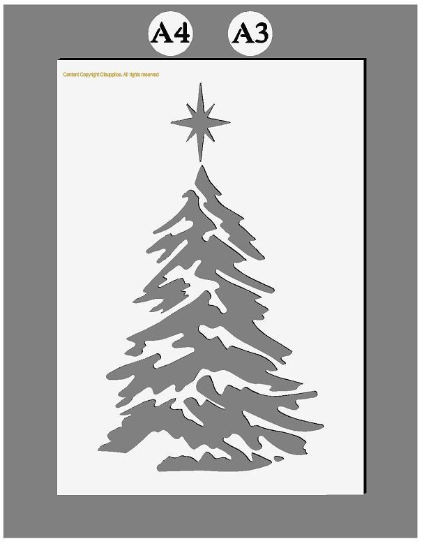 a christmas tree cutout with the shape of a star on top, and an image of