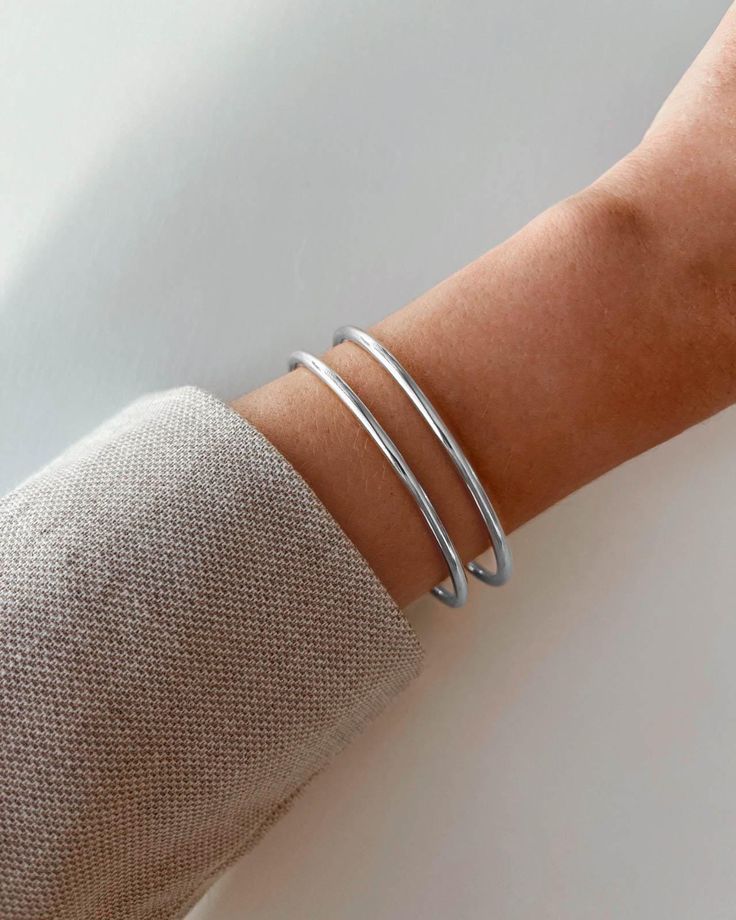 D E T A I L S : ▪ Material: high-quality 316L stainless steel ▪ Bracelet width: 3mm ▪ Available in 5 sizes ▪ Hypoallergenic ▪ Nickel free ▪ Will not be darkened ▪ Non tarnish ▪ Will not fade Length of the inner circumference of the bangle: ▪ XS - 17.6cm / 6.9 inches ▪ S - 18.5cm / 7.3 inches ▪ M - 19.5cm / 7.7 inches ▪ L - 20cm / 7.9 inches ▪ XL - 21cm / 8.3 inches This bracelet is carefully crafted from 316L stainless steel. 316L stainless steel is the same material used in medical instruments, Minimalist Silver Wristband With Bracelet Strap, Minimalist Silver Wristband For Everyday, Silver Minimalist Bracelet, Silver Bangle Wristband For Everyday, Everyday Silver Minimalist Wristband, Silver Double Band Bracelets For Everyday, Silver Double Band Bracelet For Everyday, Minimalist Silver Wristband, Minimalist Silver Double Band Bracelet