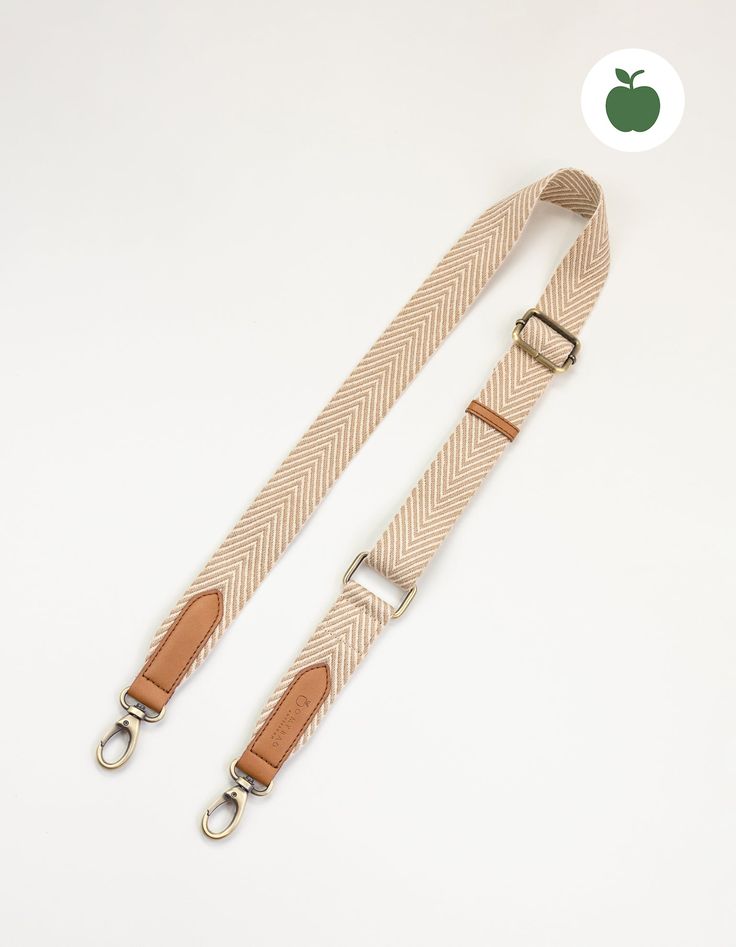 Looking to accessorise your O My Bag? Our sand coloured herringbone webbing strap is the perfect add-on for those who like a neutral color palette. This updated design measures 4cm in width, which is slightly thinner compared to our original webbing straps. All O My Bags with a detachable strap design can be styled with the sand webbing strap. This strap is completely vegan. It is made from our Vegan Uppeal™, so you can go hands free and guilt free! OMB-sandcognacstrapapple Elegant Beige Detachable Bag Strap, Casual Beige Bag Strap For Travel, Casual Beige Bag Strap For Daily Use, Elegant Beige Adjustable Bag Strap, Beige Rectangular Bag Strap, Casual Style, Beige Rectangular Casual Bag Strap, Casual Beige Rectangular Bag Strap, Cream Rectangular Bag Strap With Detachable Feature, Beige Leather Handle Bag Strap For Everyday Use