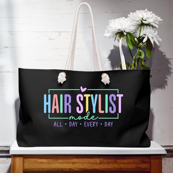 a black tote bag with the words hair stylist made all day every day