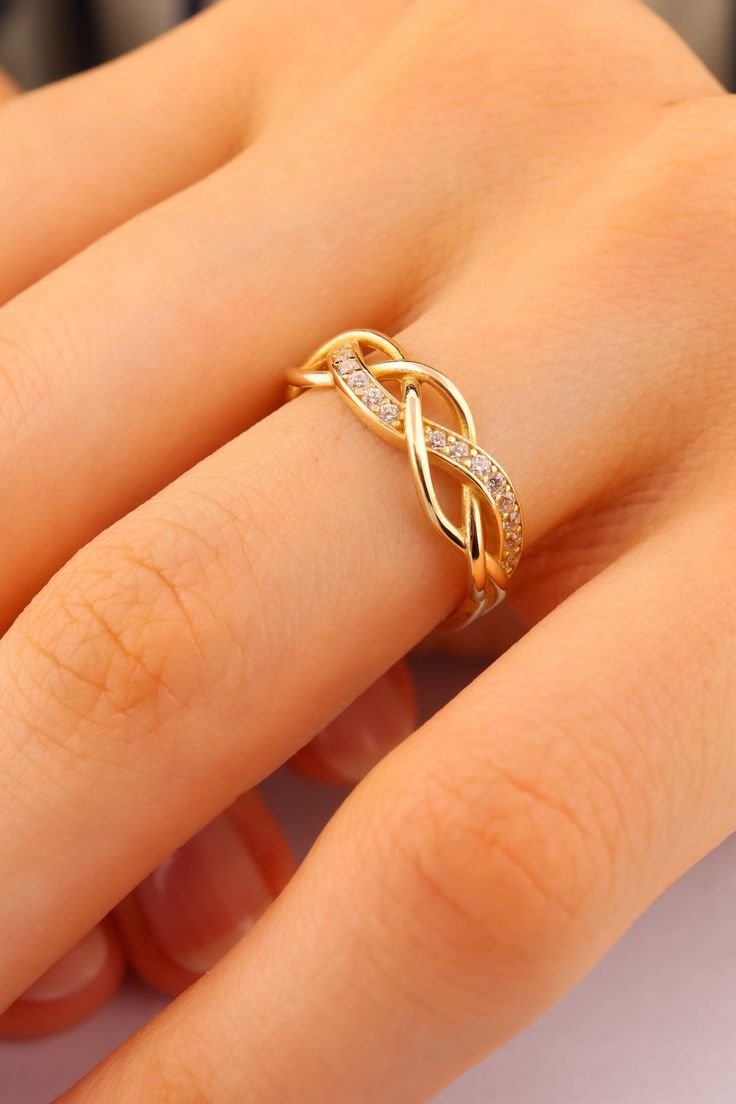 14K Solid Gold Twist Ring - Twist Band Ring - Wide Ring - Solid Gold Stackable Ring - Everyday Ring - Daintly Twist Ring -Gift For Her This solid gold dainty ring is made entirely from 14k solid gold. * Jewelry is packaged and shipped in a delicate jewelry gift box. * If you are purchasing it as a gift, please feel free to add a personal note. Anniversary, Gift For Wife, Christmas Gift Gold Kt: 14K solid gold * Available Gold Color:  * Guaranteed Authentic 14k Gold, Not Plated Or Filled * Stamp: Twist Gold Ring, Casual Rings Women, Simple Gold Rings For Women, Gold Infinity Ring With Prong Setting, Modern Gold Ring Design For Women, Gold Infinity Promise Ring, Gold Infinity Diamond Ring Gift, Minimal Rings Gold, Simple Ring Designs Gold