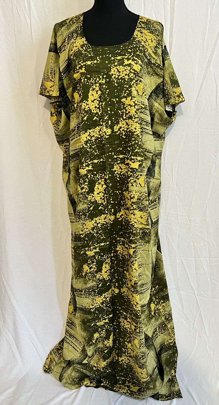 -One size fits all short sleeve baati dress.  -Machine washable.  -Length: 60 Inches -Width: 33 inches -Handmade.  -100% rayon fabric -Some fabrics might be slightly different than others We can also customize the sizes upon customer's request Green V-neck Batik Print Dress, Green Short Sleeve Dress For Vacation, Yellow Cotton Dress With Batik Print, Long Batik Print Dress For Spring, Long Batik Print Spring Dress, Green Batik Print V-neck Dress, Spring Long Batik Print Dresses, Long Spring Dress With Batik Print, Printed Rayon Midi Dress With Short Sleeves