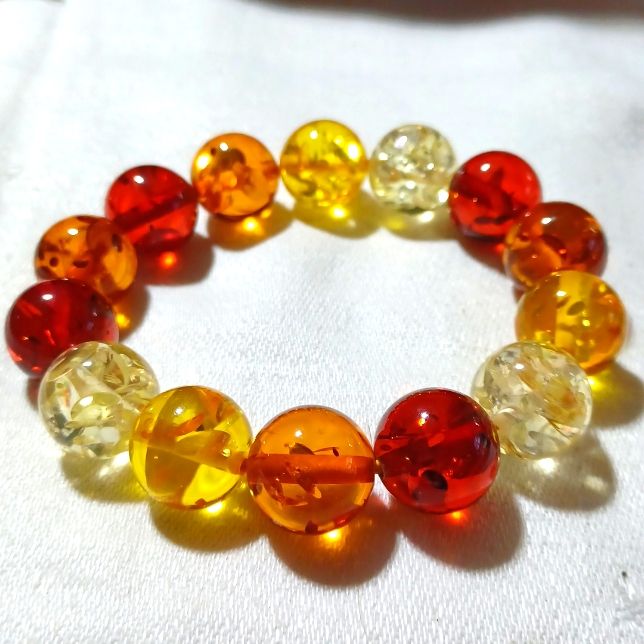 This Is A Gorgeous, Handmade Amber Bracelet. It Is Manmade Amber And Comes With A Certificate, And It Is Beautiful! My Pictures Come Close To Showing How Beautiful These Beads Are. They Look And Feel Like True Amber. The Size Of The Beads Is 20mm Or 5/8". Large And Bold And Beautiful! This Golden Colored Jewelry Item Will Enhance Almost Any Outfit With Amber Colors. I Hope You Like It. Thanks For Stopping By And Feel Free To Leave Me A Fair Offer. :) Casual Round Yellow Jewelry, Casual Yellow Round Jewelry, Yellow Beaded Bracelets With Colorful Beads As A Gift, Yellow Crystal Bracelet As A Gift, Yellow Beaded Bracelet With Colorful Beads For Gift, Yellow Beaded Bracelet With Multicolor Beads As Gift, Yellow Beaded Bracelet As A Gift, Amber Color Bracelets With Colorful Beads For Gifts, Amber Beaded Bracelets With Round Beads