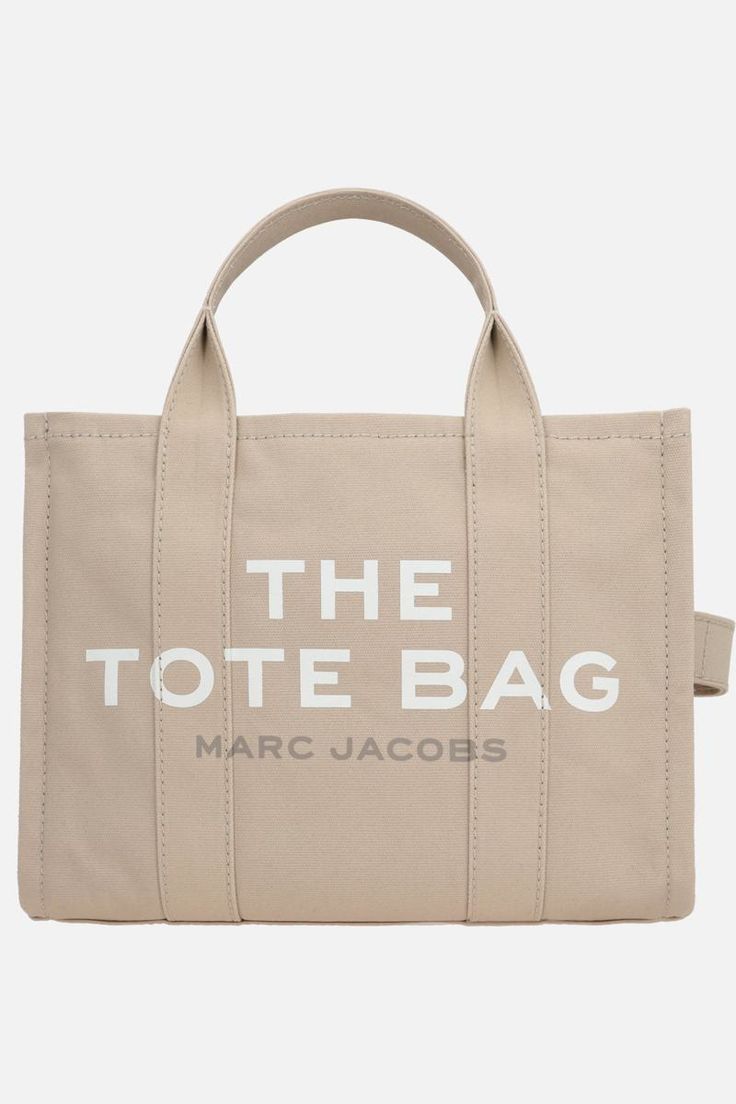 Marc Jacobs' tote bag crafted in beige canvas with screen printed logo. Featuring silver-tone hardware, internal zip closure, double handle and adjustable / removable fabric shoulder strap. Beige unlined interior with zip pocket and two flat pockets.Gender: WomenMaterial: 100% COTTONColor: BeigeMade in: VNProduct ID: M0016161260*Import tax/duty will be calculated at checkout (If applicable) Beige Logo Tote Shoulder Bag, Beige Double Handle Bag With Logo, Beige Top Handle Bags With Logo, Beige Top Handle Shoulder Bag With Logo, On-the-go Tote Shoulder Bag With Logo, Travel Canvas Shoulder Bag With Logo, Tan Logo Tote Bag, Large Modern Beige Bag, Logo Canvas Tote Bag For Travel