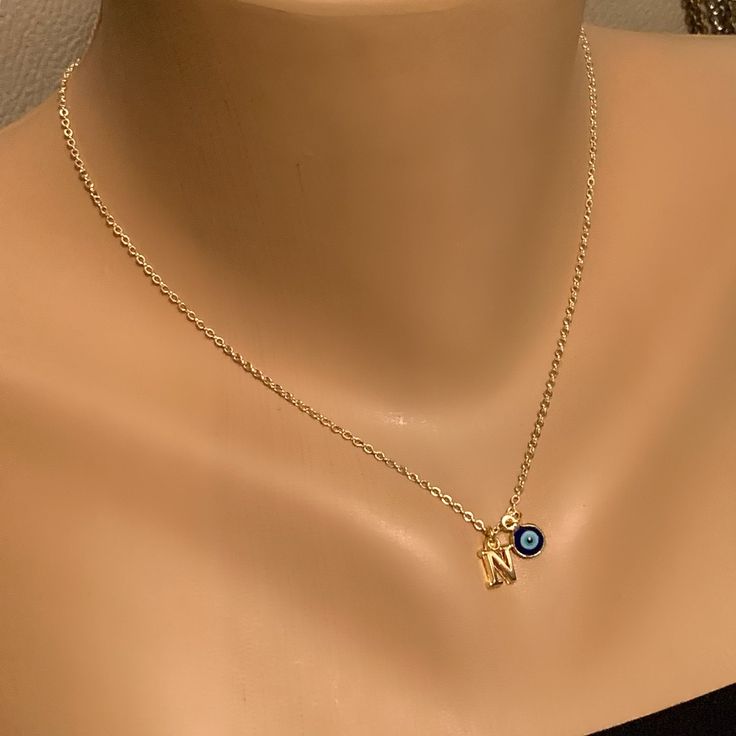 Personalized Evil Eye Pendant Gold Necklace, Initial N Necklace, N Charm Necklace, Gold Plated N Letter Necklace, Evil Eye Necklaces by NalansJewellery on Etsy N Necklace, Initial N, N Letter, Dainty Choker Necklace, Necklace Evil Eye, Pretty Jewelry Necklaces, Bridal Pearl Necklace, Necklace Initial, Gold Rings Fashion