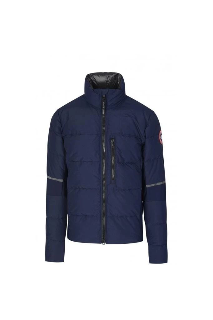 Hybridge high-neck down jacket.: Atlantic Blue.- Logo patch at the sleeve.- Front zip fastening.- Long sleeves.- Front zip fastening pockets.- Straight hem.Lining: Feather Down 100%, Nylon 100%.Outer: Nylon 100%, Polyester 94%, Spandex/Elastane 6%.: Machine Wash Sporty Down Puffer Jacket With Zipper, Sporty Down Puffer Jacket With Zipper Closure, Navy Nylon Outerwear For Outdoor, Urban Blue Nylon Outerwear, Urban Nylon Puffer Jacket With Zipper Closure, Navy Nylon Functional Outerwear, Outdoor Down Outerwear With Zipper Closure, Urban Puffer Jacket With Zipper For Outdoor, Urban Outdoor Puffer Jacket With Zipper Closure