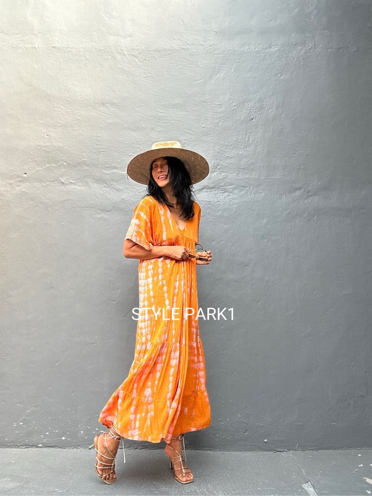 Lovina Maxi Dress A classic shape for a classic look! Our new short-sleeve Mia maxi dress are the style that make dressing both easy and effortless. Feature pleats front and back, a wearable fit that looks great on every body. Whether you're dressing up or dressing down.  A must have maxi dress for your everyday wardrobe. * Color - Hand Tie dye  Orange  &  motif  * Size  One size fits all American size From M to XL * Chest & him /130cm/51inch(round) The length /130cm/51inch * Stylepark1 Model  * Orange Free Size V-neck Maxi Dress, Orange Short Sleeve Sundress Maxi Dress, Orange Short Sleeve Maxi Sundress, Short Sleeve Orange Summer Dress, Orange Short Sleeve Sundress, Orange Short Sleeve Summer Dress, Orange Sundress With Short Sleeves, Casual Free Size V-neck Maxi Dress, Relaxed Fit Sundress Maxi Dress